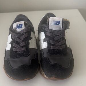 New Balance Kids' Black and White Sneakers